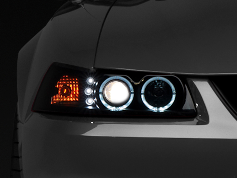 Raxiom 99-04 Ford Mustang Dual LED Halo Projector Headlights- Black Housing (Smoked Lens) - 49113