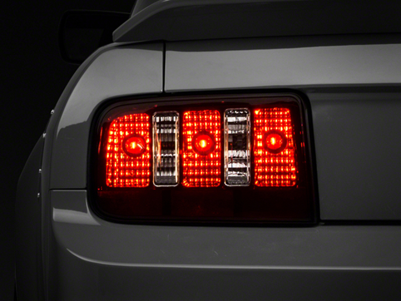 Raxiom 05-09 Ford Mustang Coyote Tail Lights- Blk Housing (Smoked Lens) - 49117