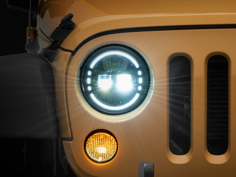 Raxiom 97-18 Jeep Wrangler TJ/JK Axial 7-Inch LED Headlights w/ DRL- Black Housing (Clear Lens) - J155570