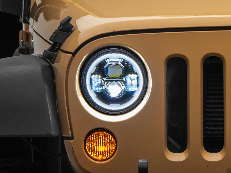 Raxiom 07-18 Jeep Wrangler JK Axial 7-In LED Headlights w/ DRL Turn Signals- Blk Housing (Clear) - J173078