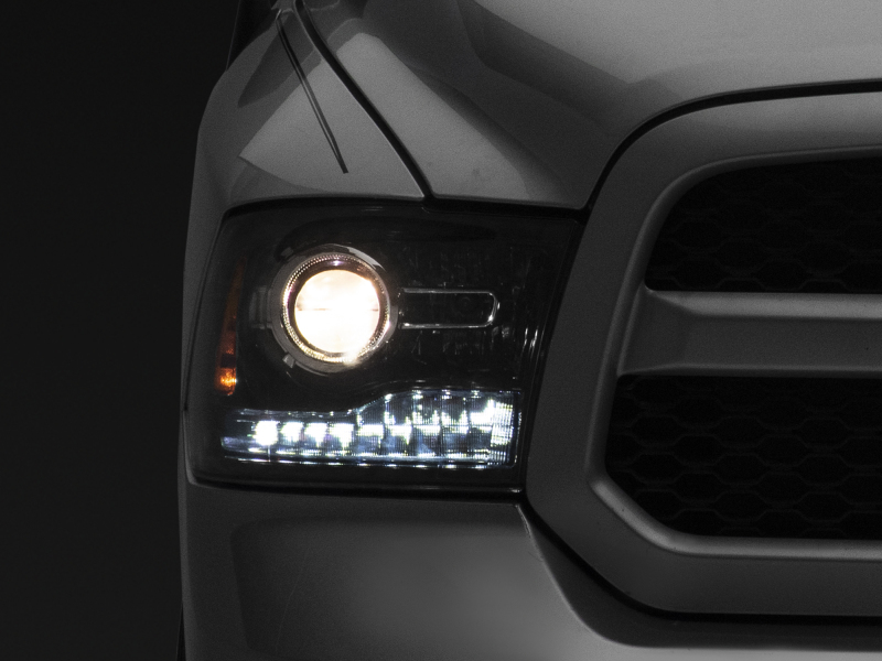Raxiom 09-18 Dodge RAM 1500 LED Halo Headlights w/Switchback Turn Signals- Blk Housing (Clear Lens) - R111518