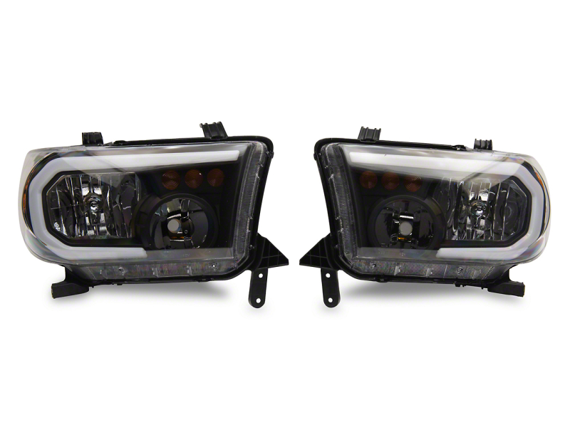 Raxiom 07-13 Toyota Tundra Axial Series Headlights w/ SEQL LED Bar- Blk Housing (Clear Lens) - TU16005