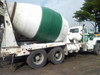 Concrete self mixer 10 tons on 1997 Used Mark Truck for sale side view