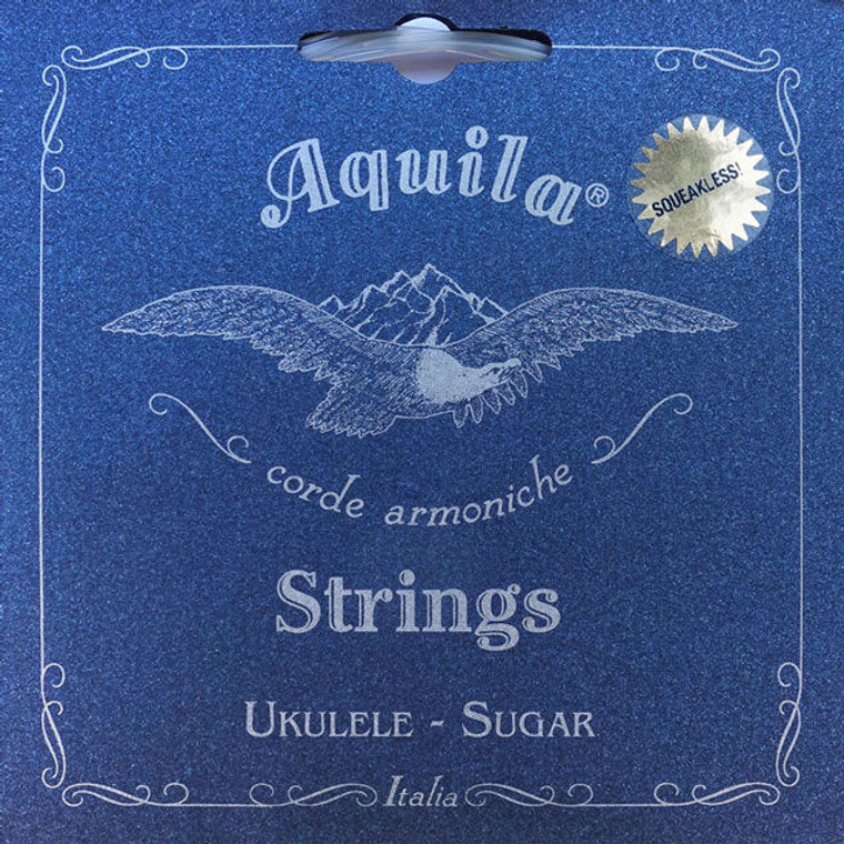 Aquila Sugar Series High-G Tenor Ukulele String Set Sugar Series

The Aquila Sugar Ukulele strings are made using a bio-plastic derived from sugar-cane that was recently discovered in Italy. The sound of these strings is clearly brilliant, clean and prompt.

Unlike the Fluorocarbon strings, Sugar strings have an excellent vibrato and a significant timbre variation when changing the right hand position from near to the bridge to over the sound hole. In other words, in their extremes, they contain both the sweetness and melodiousness of Nylon and the brightness and promptness typical of Fluorocarbon.

Another important property is the characteristic sustain, which by scientific measurements is superior to any type of string currently available in the market. Another feature that has been measured is the sound power: our scientific tests have shown that it is superior to that of Fluorocarbon strings. Although the surface is extremely smooth, the grip on the fingers is remarkable.

AQ154U - Aquila Sugar Series High-G Tenor Ukulele String Set

Position	Note	Note	Diameter (mm)	Tension (kg)	Gauge (in)
1	A	0,65	6,30	0,0260	13,89
2	E	0,82	5,62	0,0320	12,40
3	C	0,97	4,96	0,0380	10,93
4	G	0,70	5,80	0,0280	12,78




SKU	AQ154U
Brand	Aquila
Type	Tenor Uke Strings
Series	Aquila Sugar Series
Set	High G
Colour	Clear
Tuning	GCEA
Complexity	Very Rich
Tone	Brilliant
Projection	Very Loud