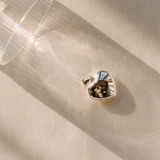 top down view of hidden pictures inside custom heirloom locket necklace