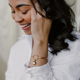 secret picture locket bracelet on wrist of woman