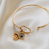 The Gold Bangle Locket, a custom picture locket bracelet by The Locket Sisters
