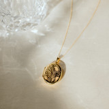 the gold evelyn locket necklace with photos