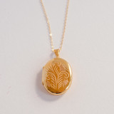 the gold evelyn locket necklace with photos