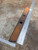 alt="Width measurement layout of an aftermarket clay spreader point compatible with Bunning agricultural spreaders."