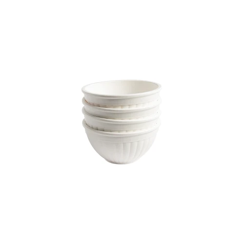 Four white mini bowls with nested together
