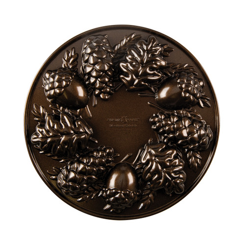 Nordic Ware Woodland Cakelet Pan, bronze aluminum with six tree-shaped cavities for individual cakes