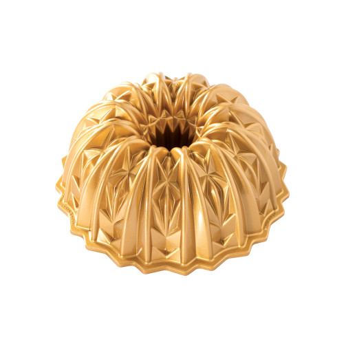 Nordic Ware Cut Crystal bundt pan with intricate geometric diamond pattern, gold aluminum finish