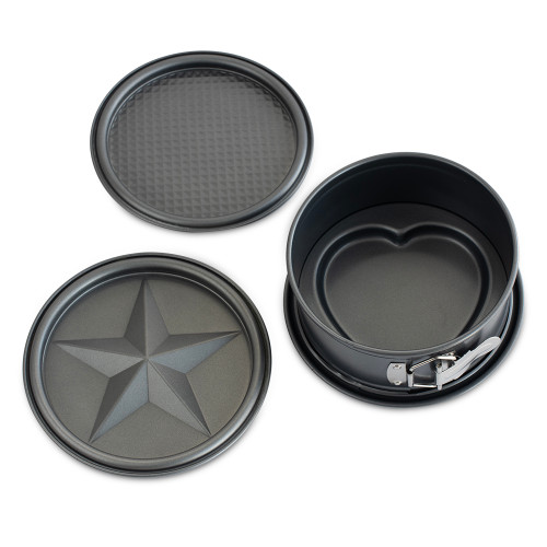 Nordic Ware 7-inch aluminum springform pan with removable bottom and three embossed decorative disc inserts