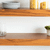 GIF of Naturals 5 Piece Set on kitchen shelf, pans stacking on top of each other for easy storage