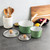 cardamom 3.5qt and 1.5 qt saucepans with lids on countertop