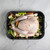 uncooked turkey and veggies prepped inside Nordic Ware Verde Grand Roaster with speckled nonstick interior and stainless steel handles