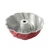 Red Nordic Ware aluminum swirl bundt pan with white translucent plastic cake keeper dome