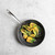 Nordic Ware Basalt 10-inch sauté skillet with dark non-stick interior and light exterior finish