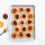 Nordic Ware aluminum half sheet pan with baked peanut butter and jelly cookies, golden brown finish