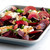 Nordic Ware aluminum quarter sheet pan with roasted red beets, natural silver finish, angled view