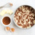 Nordic Ware Brilliant 9-inch round aluminum cake pan with unbaked marble cake batter, butter, egg, brown sugar