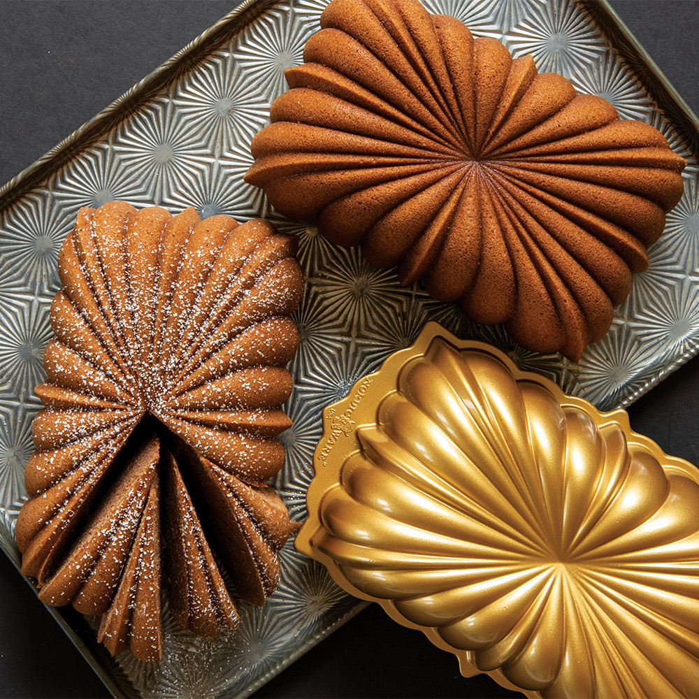 Two Fluted loaf cakes with fluted loaf pan