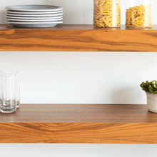GIF of Naturals 5 Piece Set on kitchen shelf, pans stacking on top of each other for easy storage