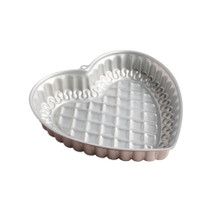 Northern Lights Quilted Heart Pan showing silver nonstick interior