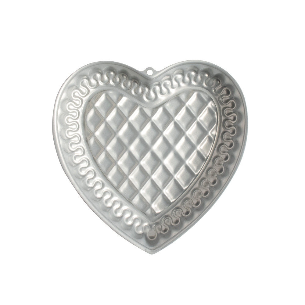 Overhead of Northern Lights Quilted Heart Pan showing silver nonstick interior