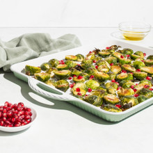 cardamom large baking sheet with baked brussel sprouts with red berries