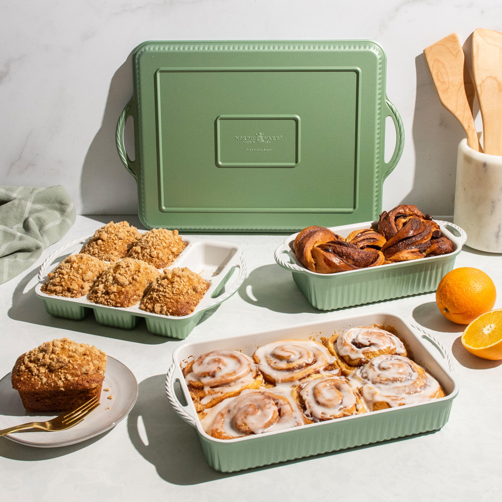 cardamom bakeware group shot with cinnamon buns, mini loaf cakes, and twisted loaf bread