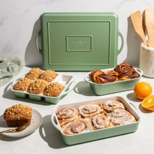 cardamom bakeware group shot with cinnamon buns, mini loaf cakes, and twisted loaf bread