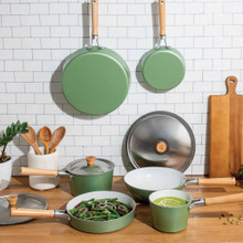 cardamom cookware lifestyle image featuring skillets, sauce pans and wok
