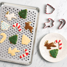 nordic ware half sheet with multi rack and red holiday cookie cutters with decorated cookies