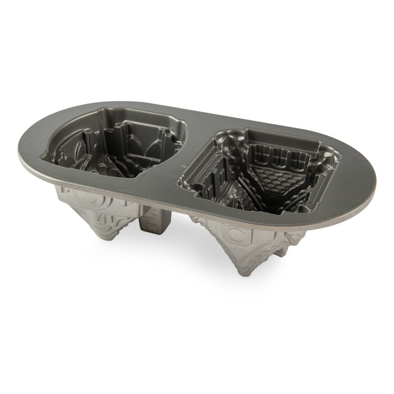 Nordic Ware Gingerbread House Duet baking pan showing silver nonstick interior with house-shaped cavities