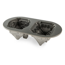 Nordic Ware Gingerbread House Duet baking pan showing silver nonstick interior with house-shaped cavities