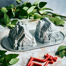 Nordic Ware aluminum gingerbread house duet baking pan with detailed molded sections, silver finish