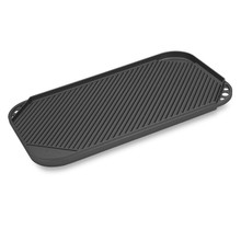 Large rectangular cast aluminum griddle with ribbed grilling surface on one side, smooth cooking surface on other