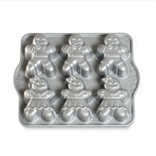 Nordic Ware aluminum gingerbread kids cakelet pan with six child-shaped cavities, natural silver finish