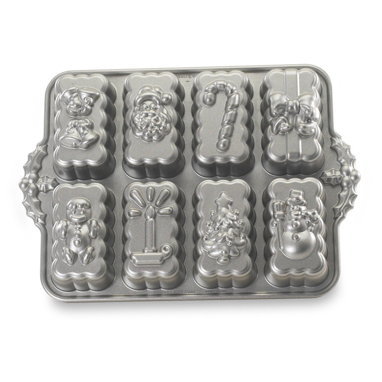 Nordic Ware aluminum mini loaf baking pan with six rectangular cavities, natural silver finish