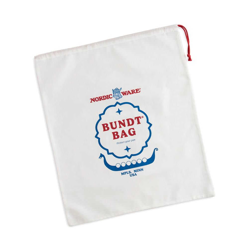 Nordic Ware white fabric bundt storage bag with drawstring closure, overhead view showing circular shape
