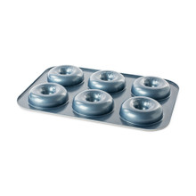Nordic Ware aluminum donut baking pan in twilight blue, 12 cavities with fluted edges for full-sized donuts