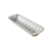Nordic Ware aluminum loaf pan interior showing detailed ridged design for cinnamon bread, gold-toned finish