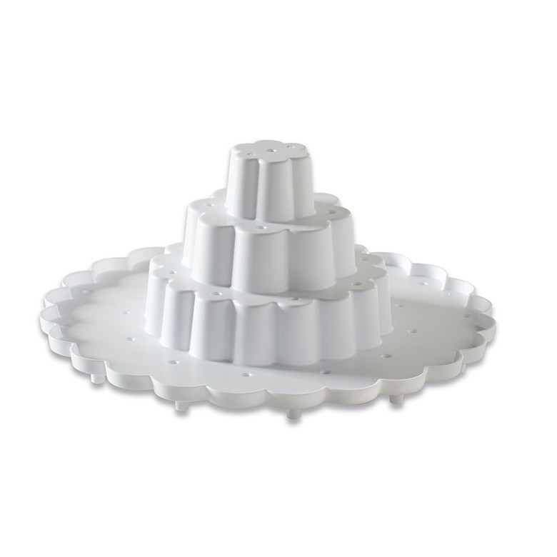 White three-tiered circular cake pop display stand with multiple holes for holding decorated cake pops on sticks