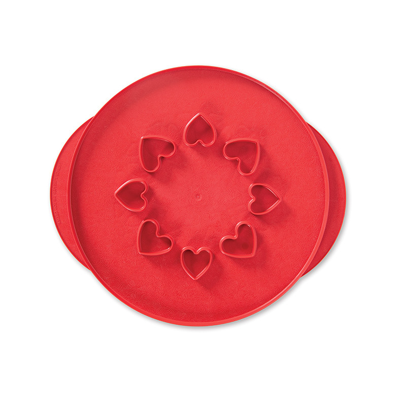 Nordic Ware aluminum pie top cutter tool with lattice pattern on one side and heart shapes on reverse