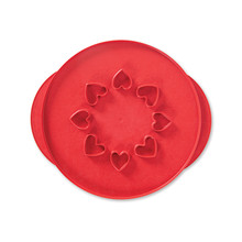 Nordic Ware aluminum pie top cutter tool with lattice pattern on one side and heart shapes on reverse