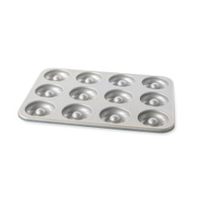 Nordic Ware mini donut pan in twilight blue with 12 donut-shaped cavities, non-stick aluminum baking mold