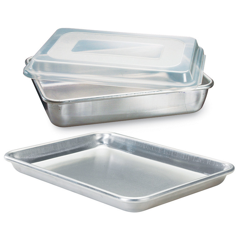 Three Nordic Ware Naturals aluminum baking pans stacked - half sheet, quarter sheet, and cooling rack with natural finish