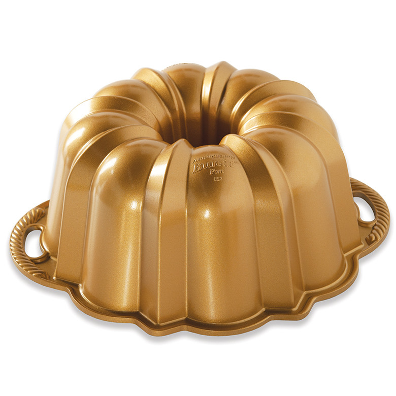 Cast aluminum bundt pan with intricate fluted design and scalloped edges, silver finish